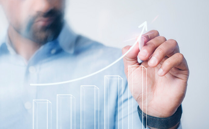 CMMS data management man drawing growth chart