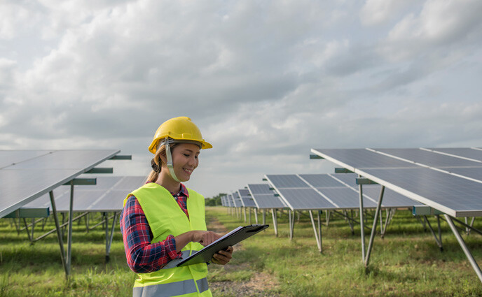 CMMS green energy female engineer electric woman checking solar cells