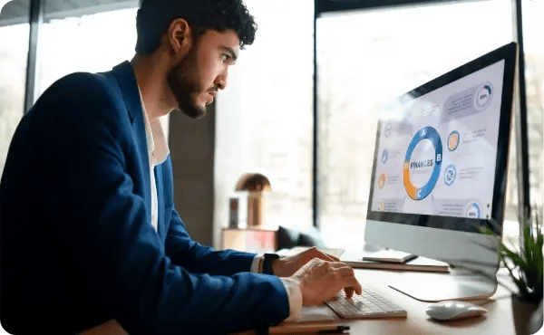 employee leveraging advanced features for preventive maintenance scheduling and asset management in CMMS