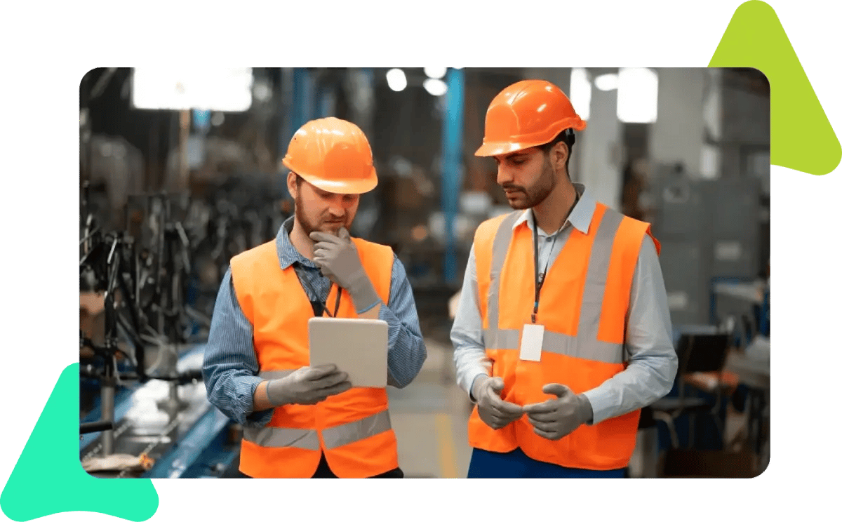 image about two employees contemplating the necessary cmms software