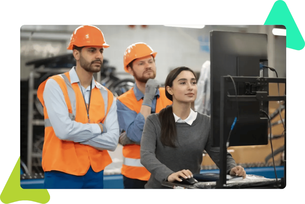image-showing-three-employees-undergoing-cmms-training
