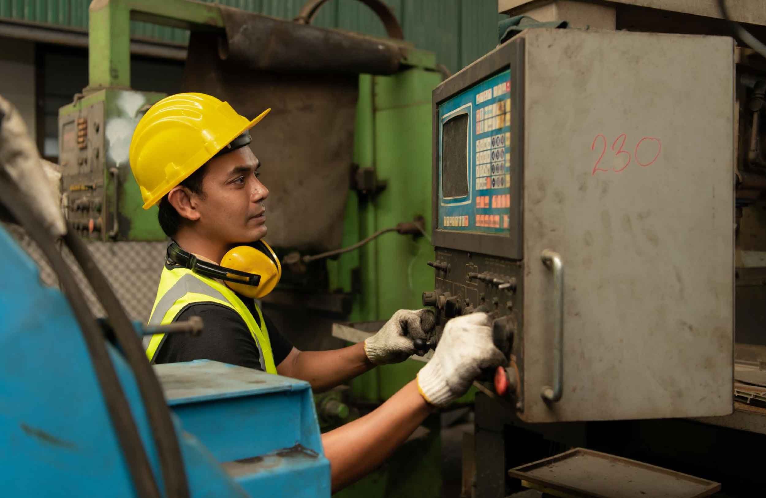 US shutdown impact on maintenance function asian mechanic working mechanical factory repairing old machines