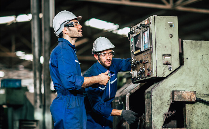 agile maintenance factory machine maintenance service engineers working together in factory