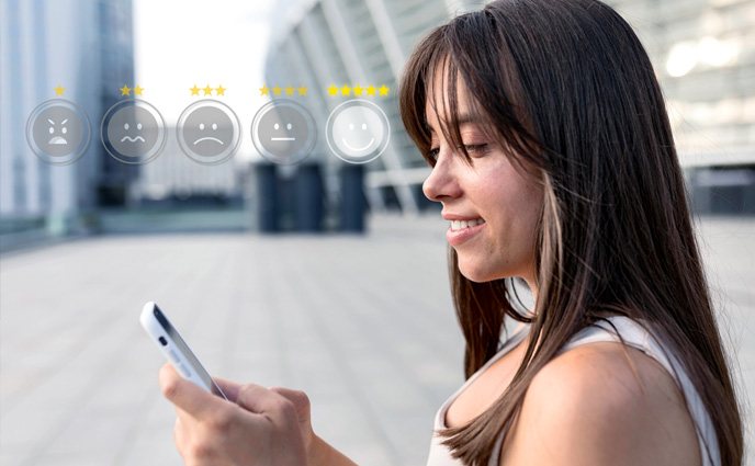 cmms evaluation woman smiling looking at phone