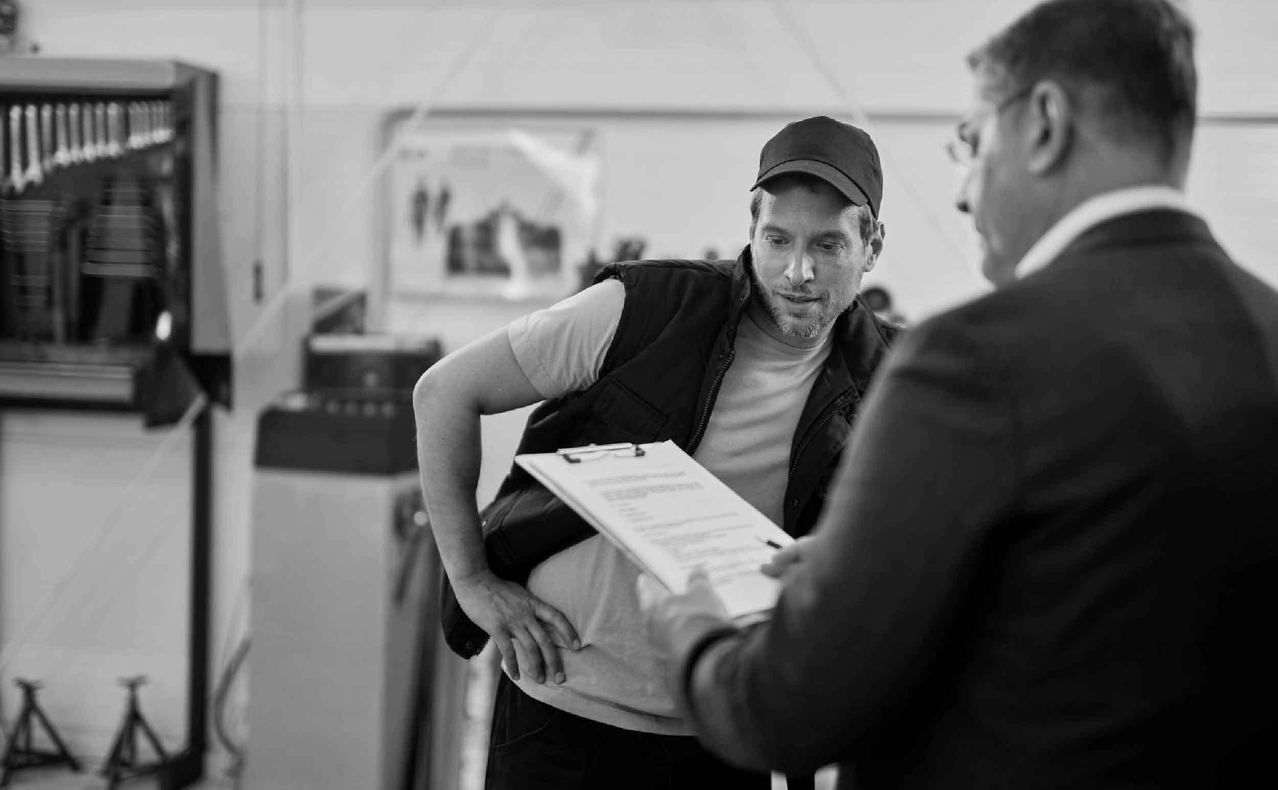 cmms maturity models businessman analyzing reports while working