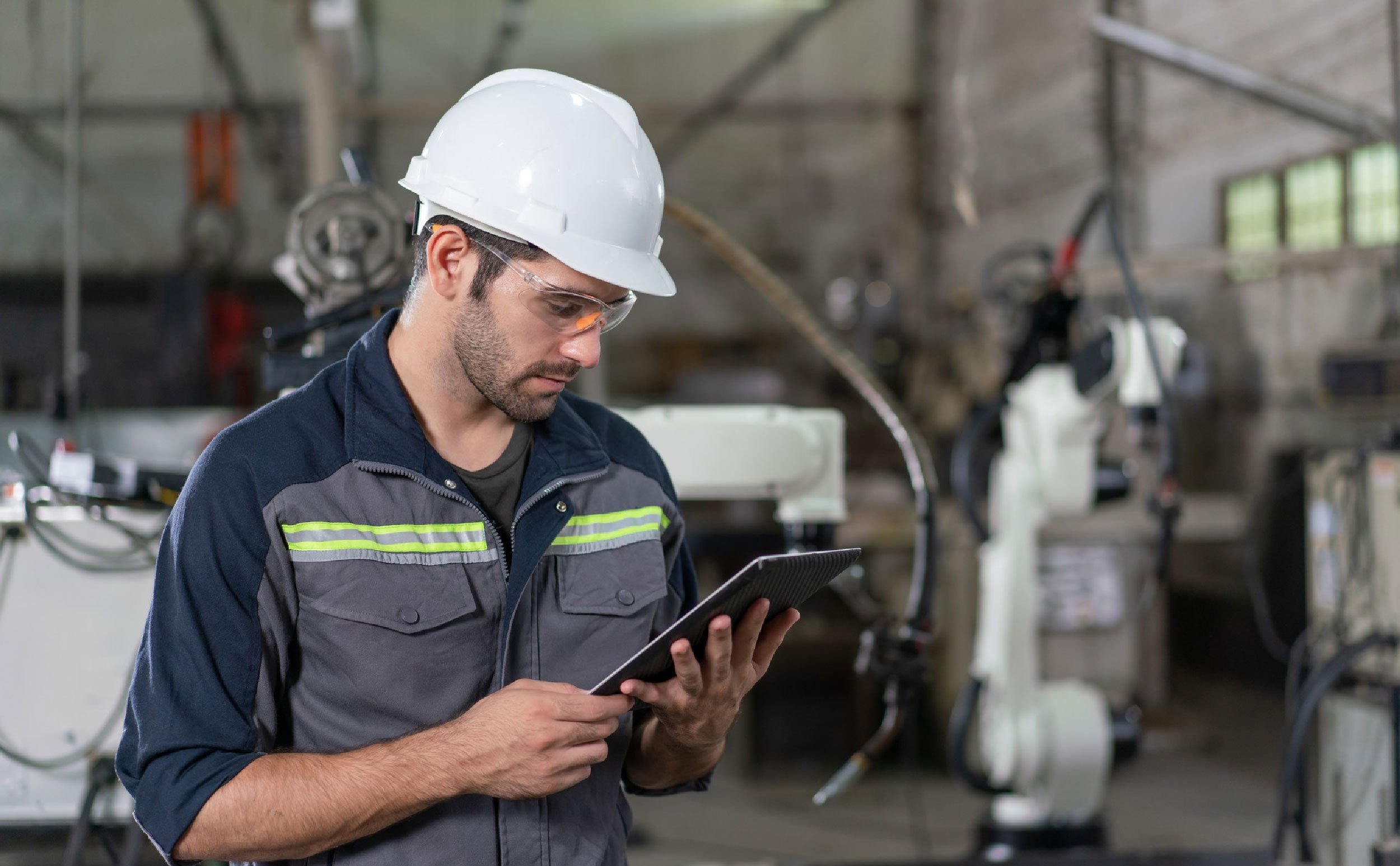 cmms scales maintenance male automation engineer using tablet