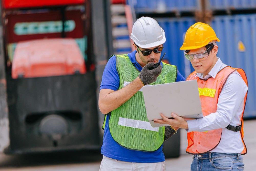 cmms software misconceptions group port container ship-yard colleague workers working together