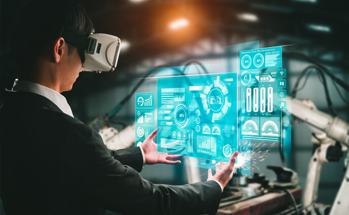 cmms trends 2025 worker using advanced robot arm system