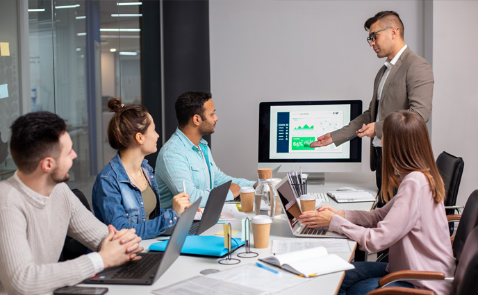 enterprise cmms software features erp integration business meeting