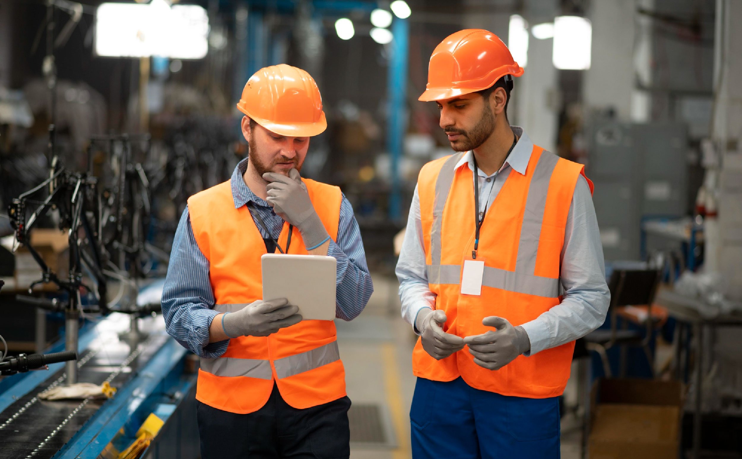 gen ai cmms men safety equipment working together factory