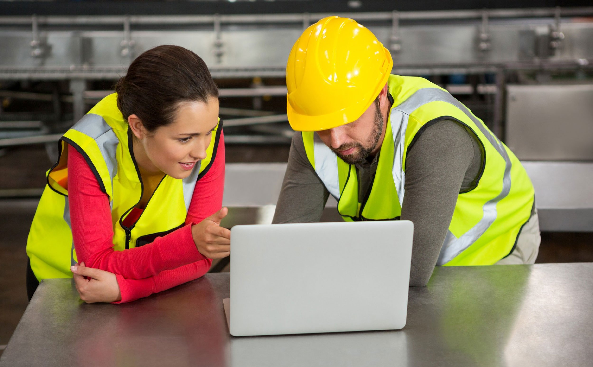 maintenance management success workers using laptop factory