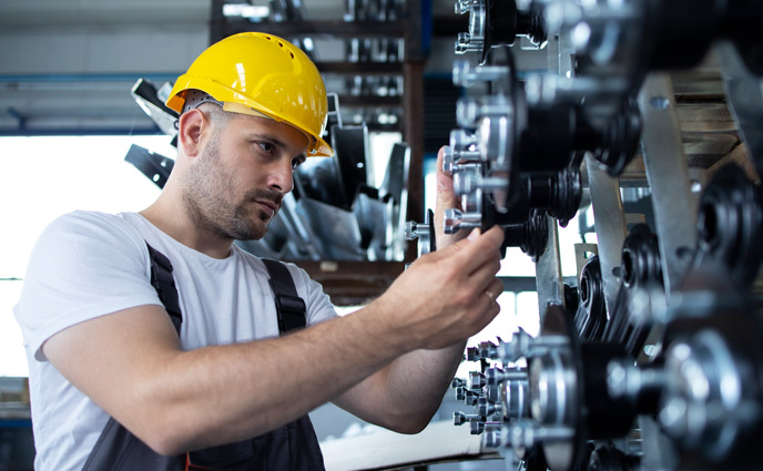 maintenance operations industrial worker working production line factory