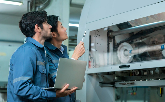 maintenance troubleshooting engineer professional having discussion standing consult machine factory