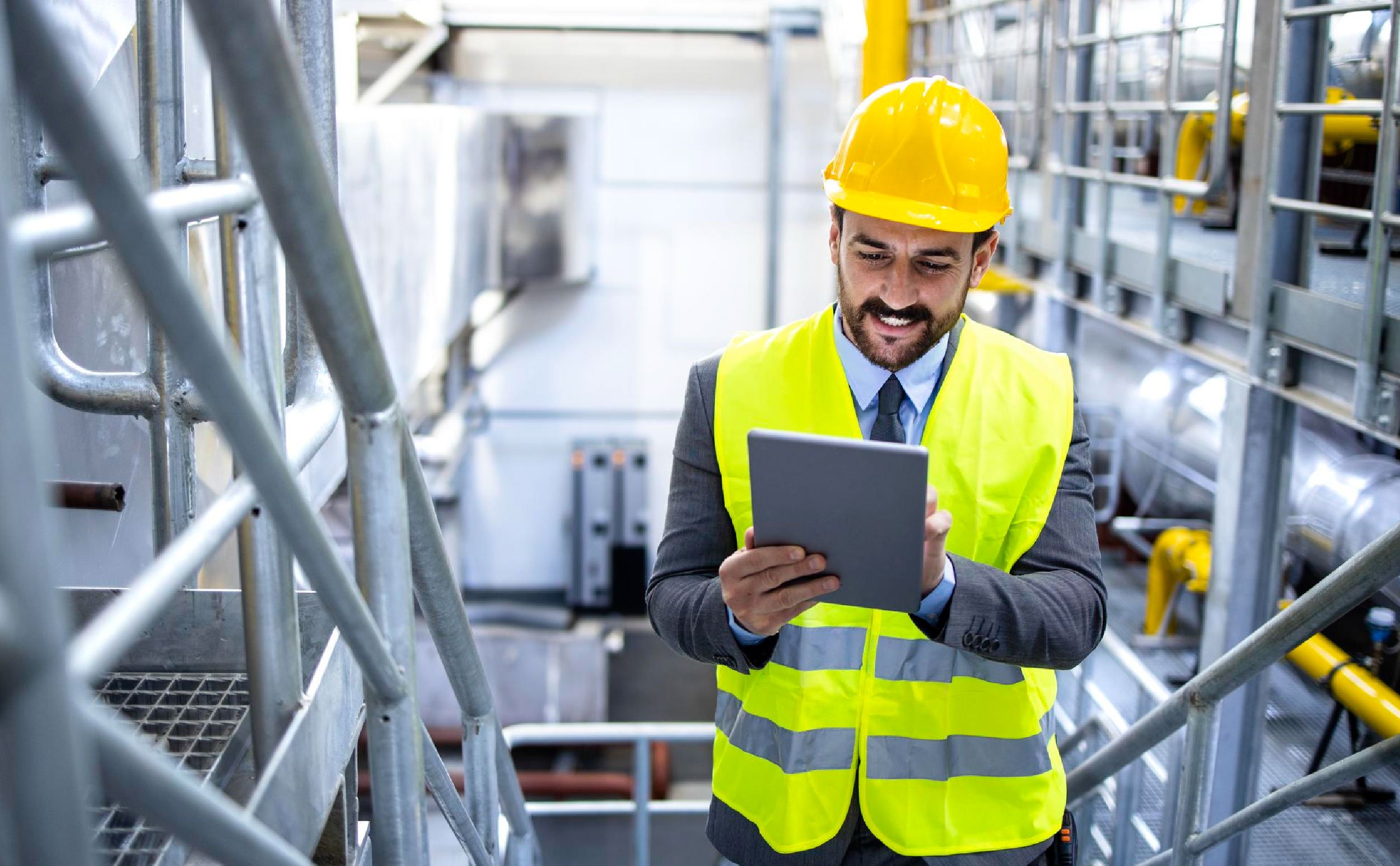 best-in-class work orders factory manager hardhat checking results tablet