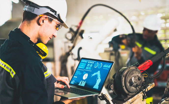 microsoft excel to cmms young factory worker working with adept robotic arm