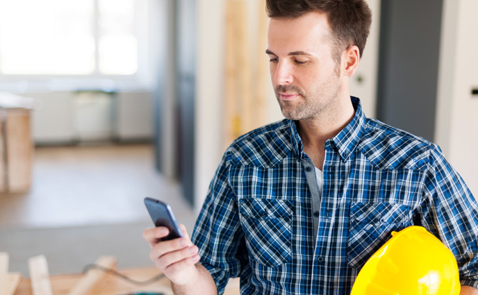 nlp work order management engineer looking at phone