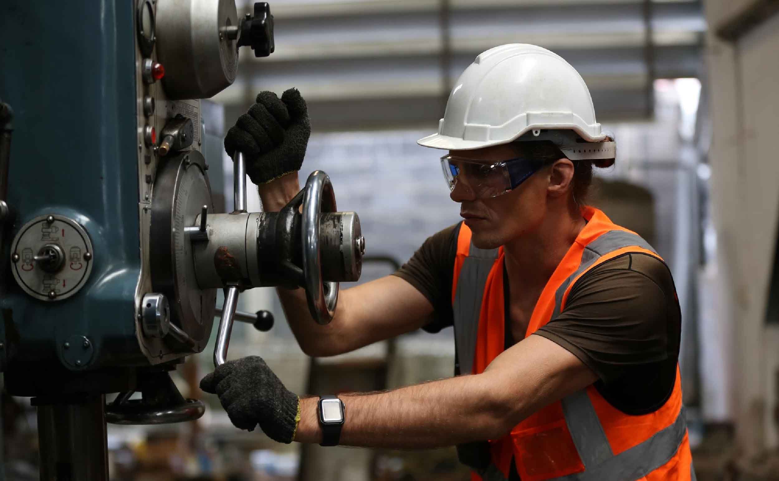 planned downtime side view man working factory