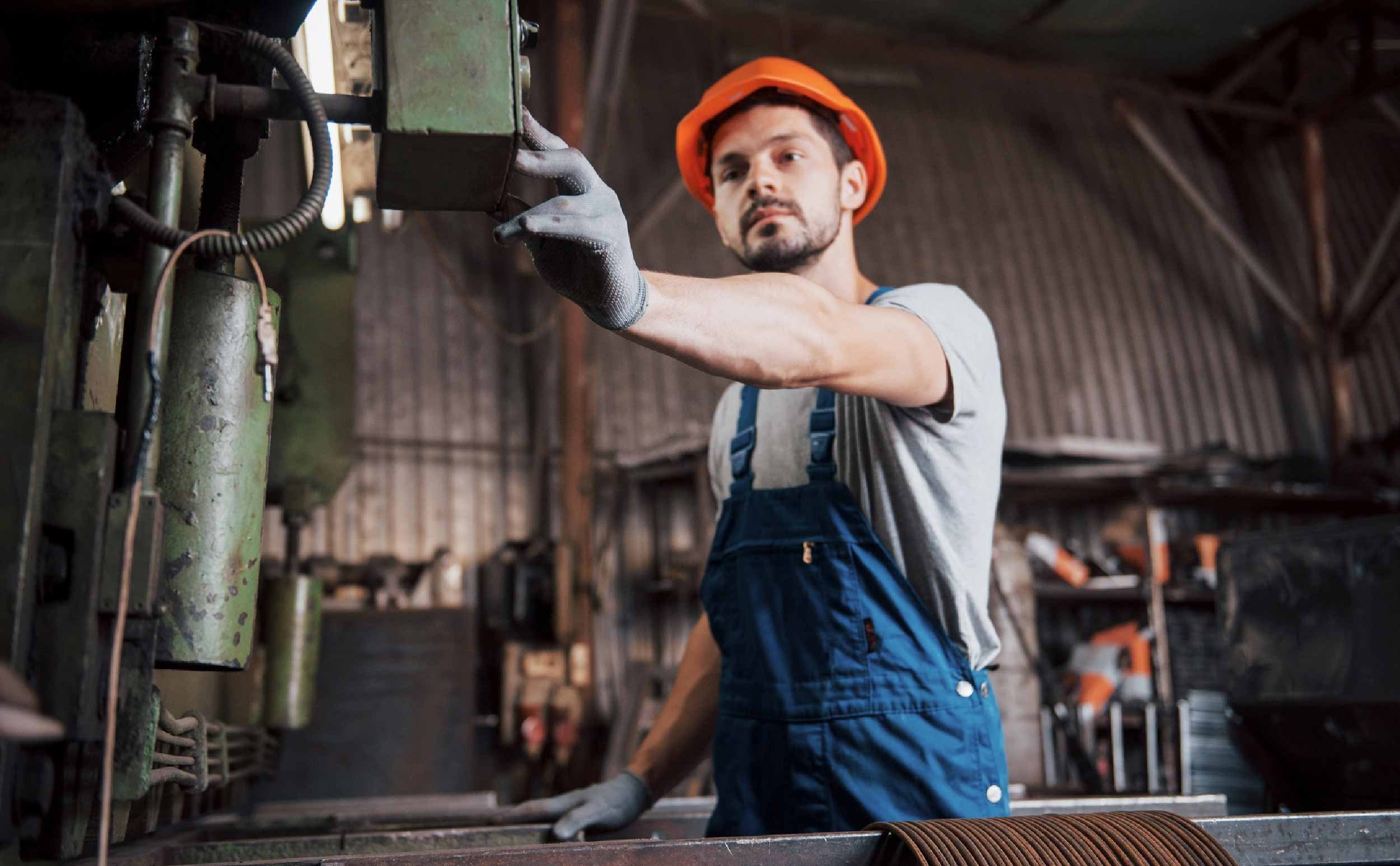 preventive maintenance compliance importance young worker working at factory
