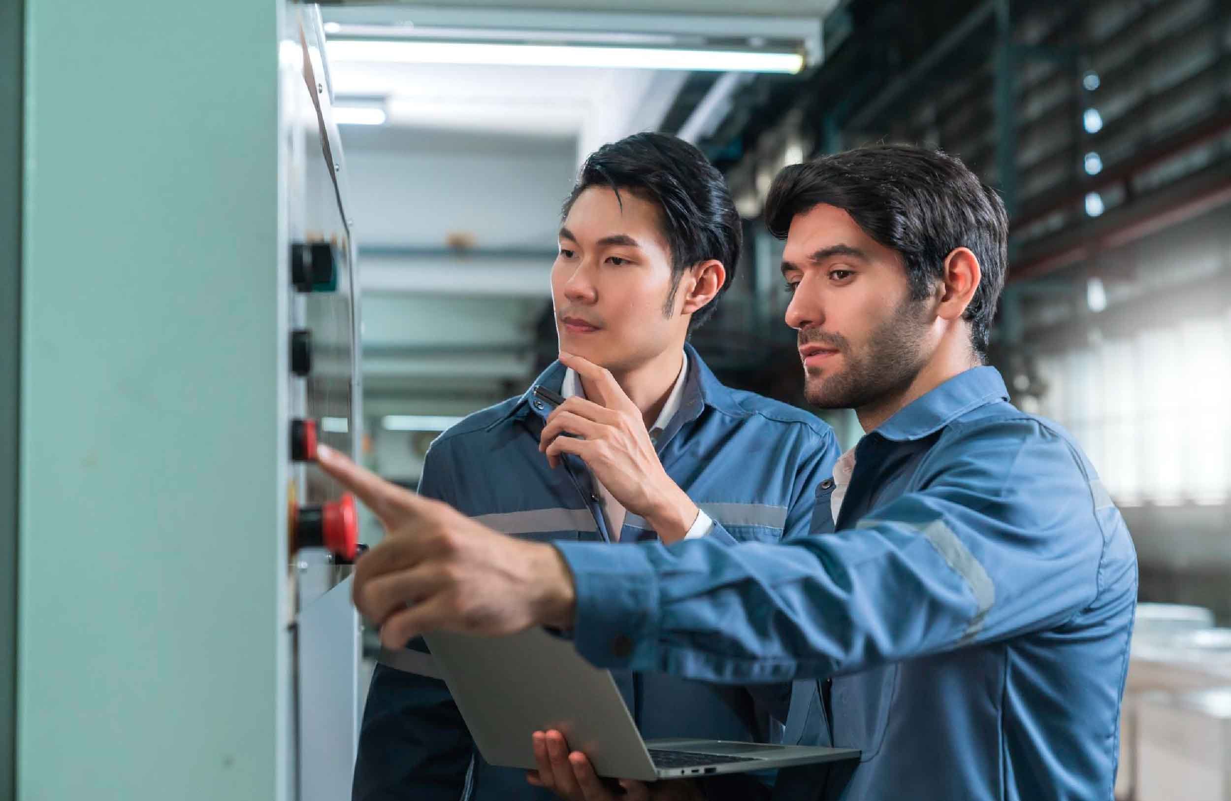 replacement asset value engineer professional having discussion standing consult machine factory