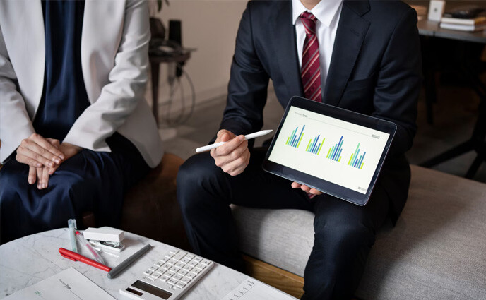 top 5 enterprise asset management eam software business people working with ipad