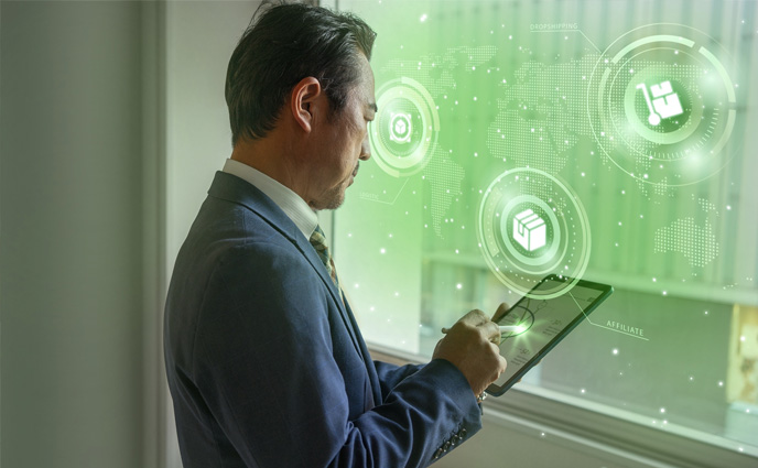 work order lifecycle automation man using tablet with hologram collage