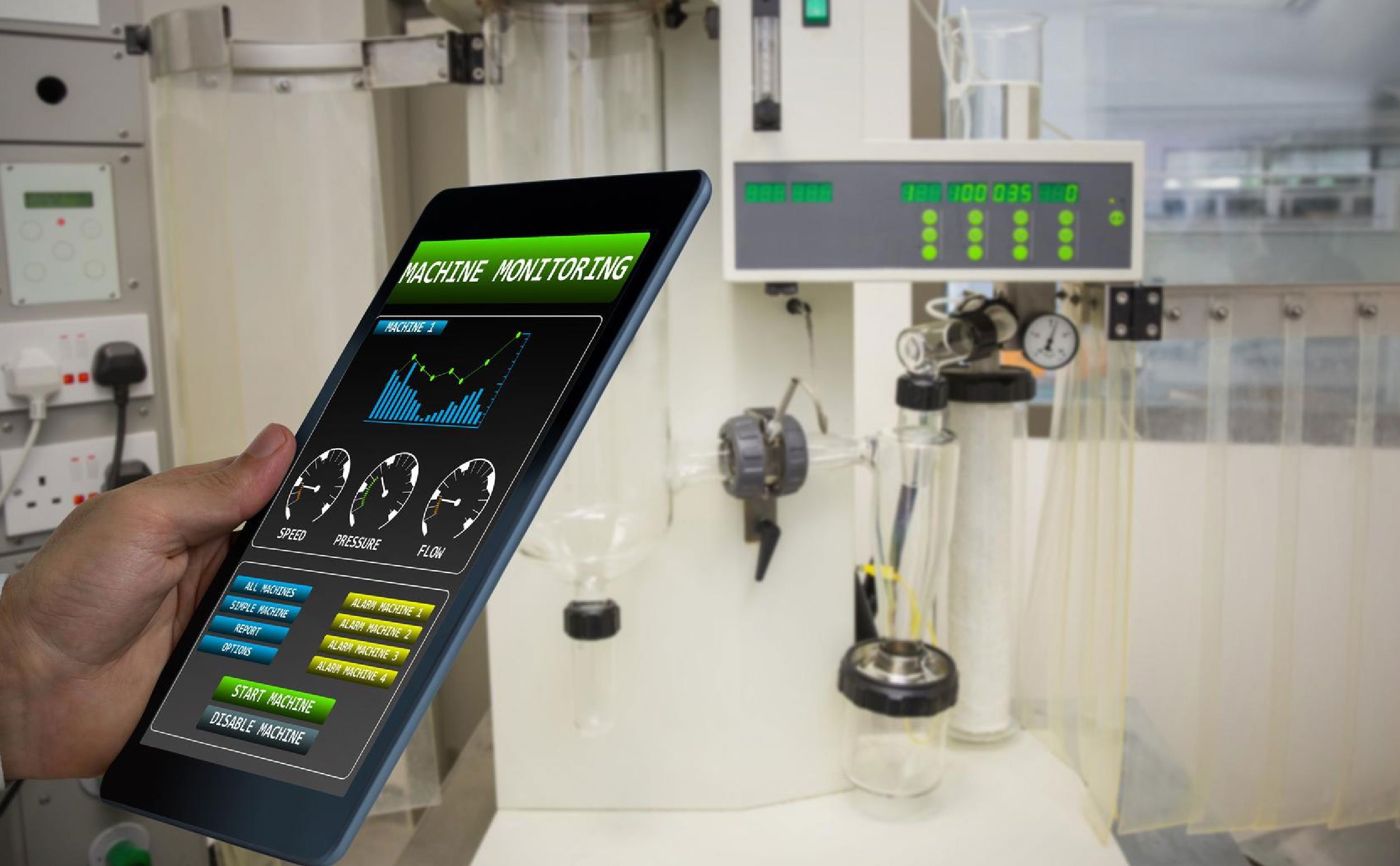 zero-touch work orders man using tablet for machine monitoring